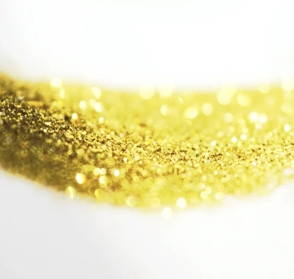 Bellissimo sfondo sfocato con brillantini dorati in colori vintage — Foto Stock