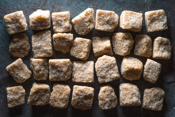 Arka plan gri taş şeker kamışı küpler