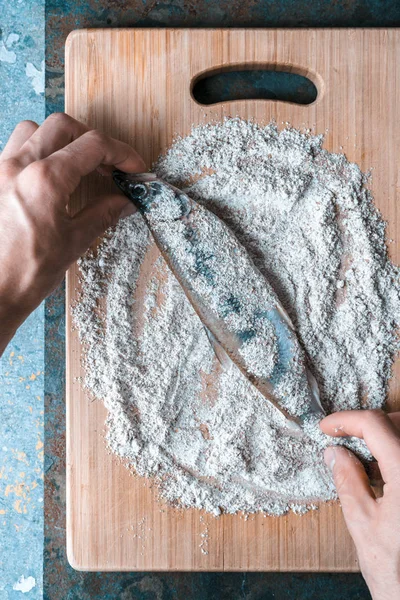 Fish on a flour on a cutting board — Stock Photo, Image