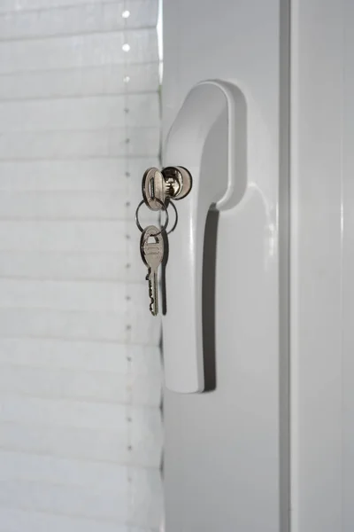 Security technology - lock on door window handle as burglary pro — Stock Photo, Image