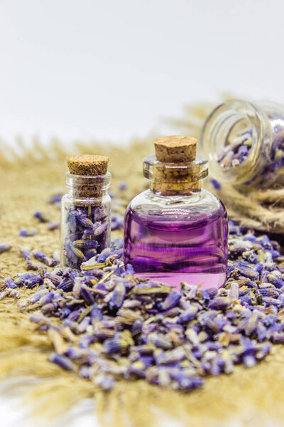 Lavender essential oil in a small bottle.