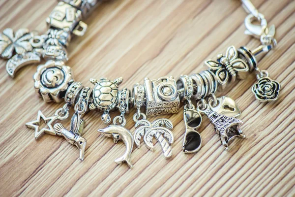 The jewelry pendants charms. selective focus. — Stock Photo, Image