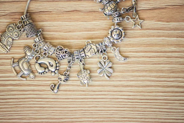 The jewelry pendants charms. selective focus. — Stock Photo, Image