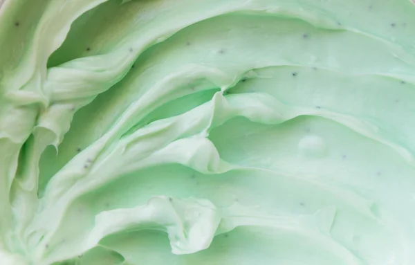 Cream, scrub, body mask green with exfoliating particles. Selective focus. — Stock Photo, Image
