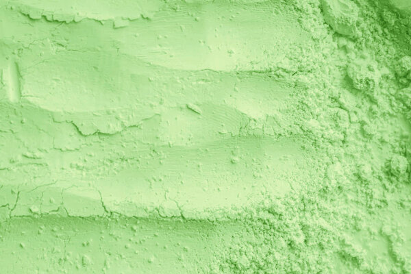 green clay dry powder cosmetic texture. 