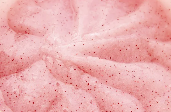 Textura gel cosmético para la cara y el cuerpo rojo, rosa. Enfoque selectivo . — Foto de Stock