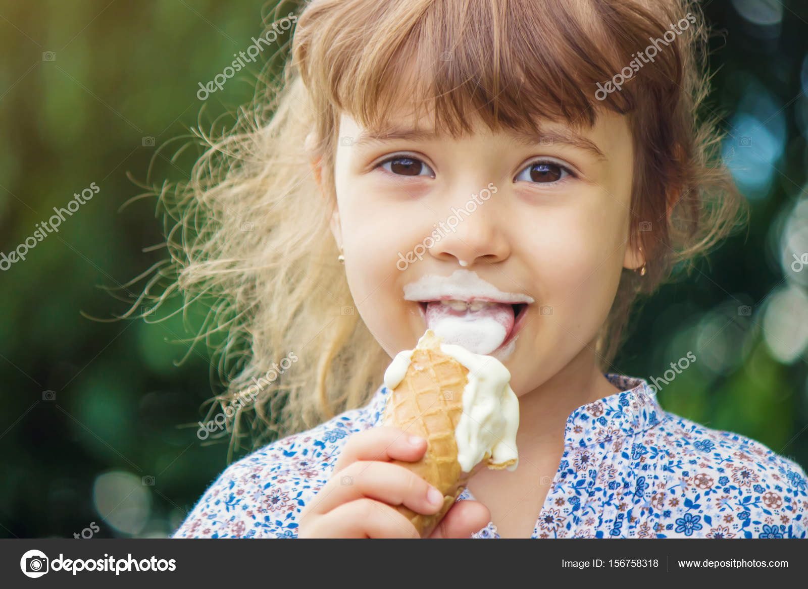 The child eats ice cream. Selective focus. Stock Photo by ©yanakomisarenkoyandex.ru 156758318