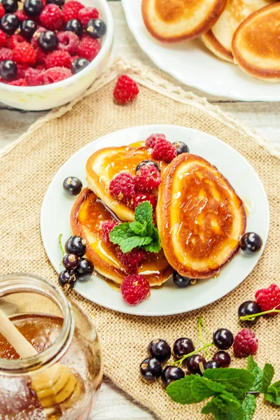 Pancakes on a light background. selective focus. — Stock Photo, Image