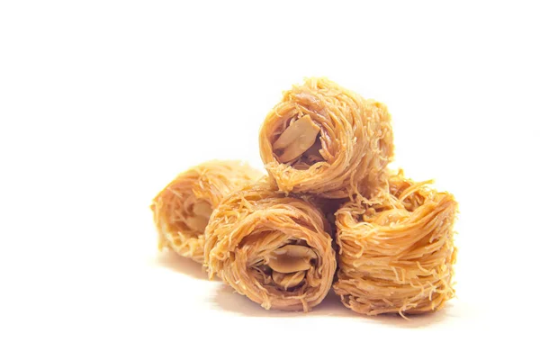 Eastern dessert baklava with peanuts and honey. Selective focus. — Stock Photo, Image