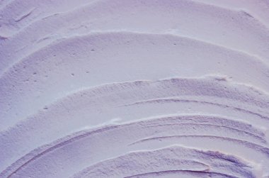 Kozmetik maskesi kil için yüz ve vücut lavanta ekstresi ile doku. Seçici odak.