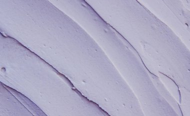 Kozmetik maskesi kil için yüz ve vücut lavanta ekstresi ile doku. Seçici odak.