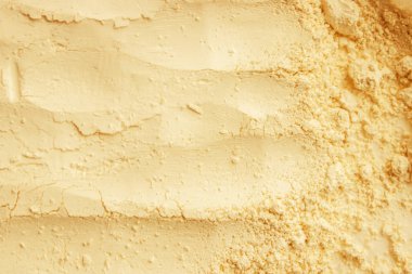 Sarı tozu kuru kil maskesi. Kozmetik doku yüz ve vücut için. Seçici odak.