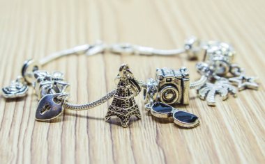 bracelet with charms. selective focus. clipart