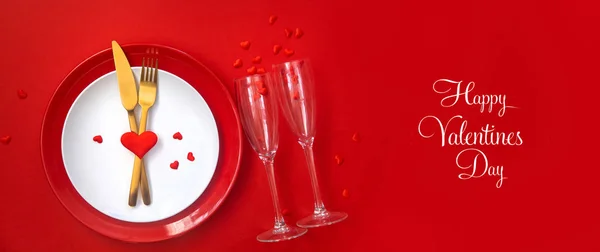 Romantic dinner for Valentine's day on a red background. Selective focus. — 스톡 사진