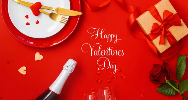 Romantic dinner for Valentine's day on a red background. Selective focus. — ストック写真