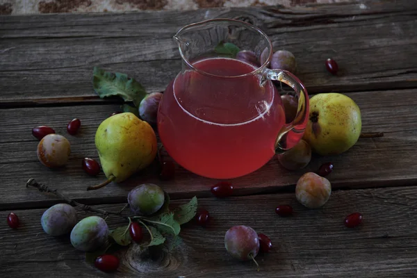 Still life with compote of fresh plums and pears — Stock Photo, Image