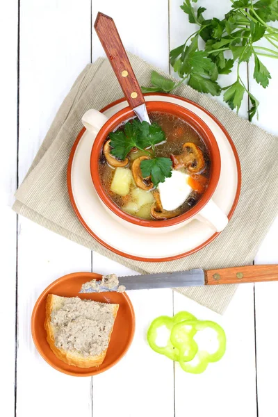 Soup from field mushrooms with a potato and greens — Stock Photo, Image