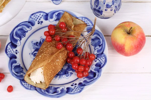 Pancake with curd and red Apple with Kalina — Stock Photo, Image