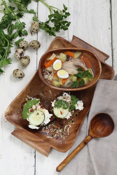 Quail soup and sandwich of bread with cheese , cucumber and cila — Stock Photo, Image