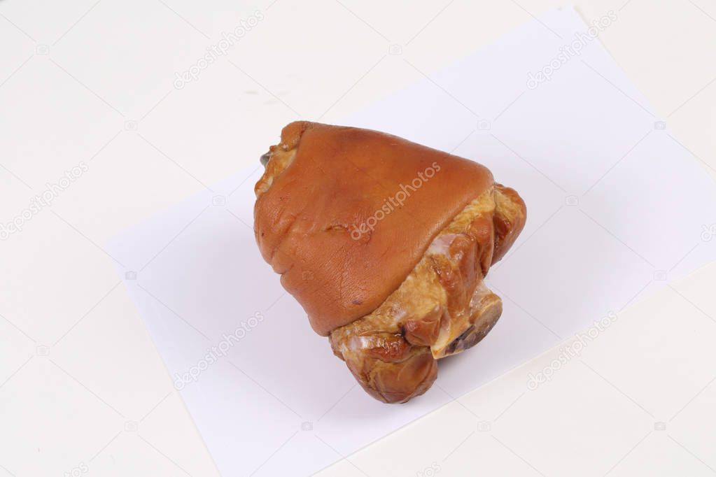 smoked-boiled pork shank on a white background