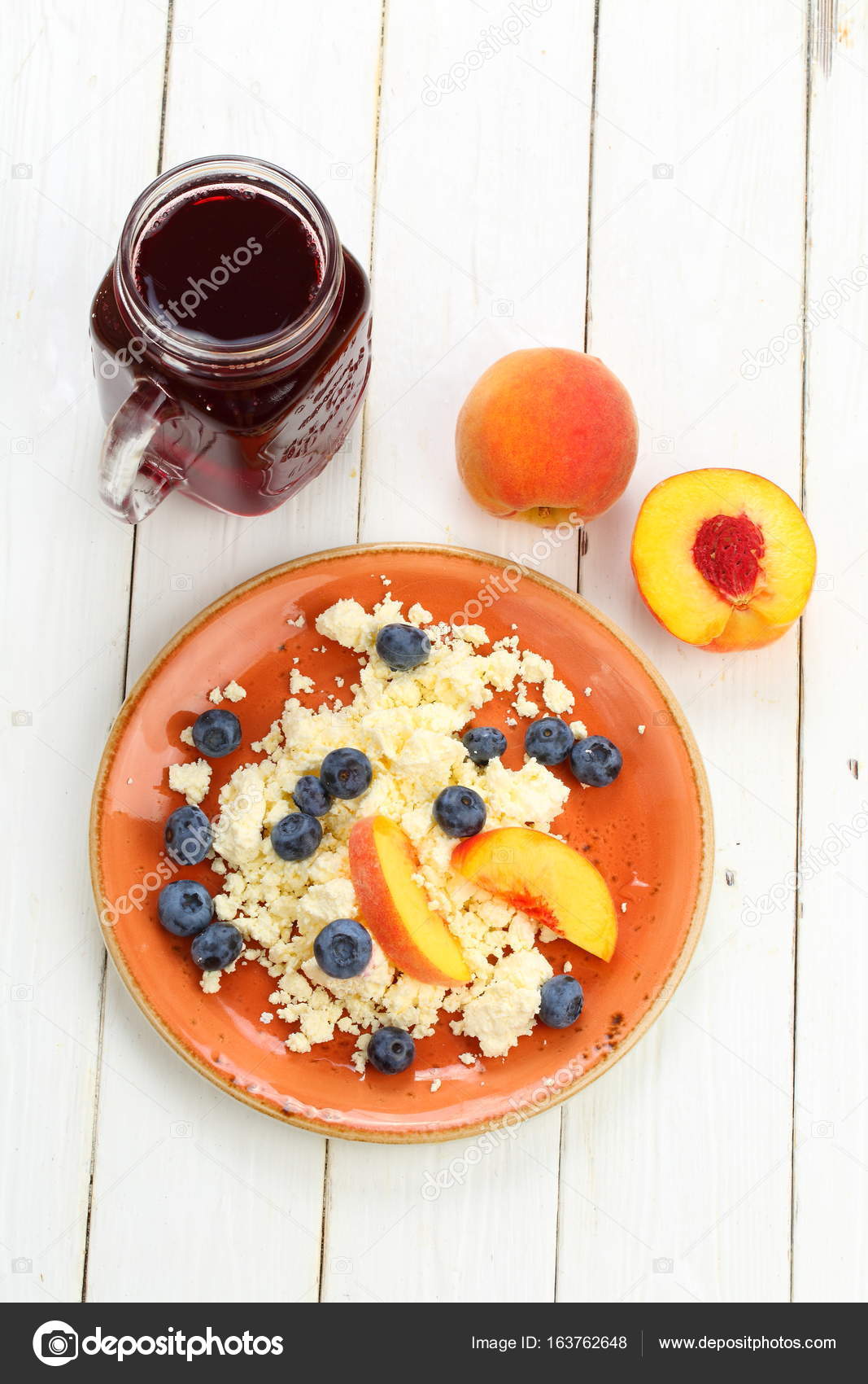 Cottage Cheese With Blueberries And Peaches And Smoothies On White