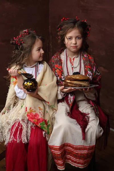 Two Girls Beautiful Russian Costumes Keep Pancakes — Stock Photo, Image