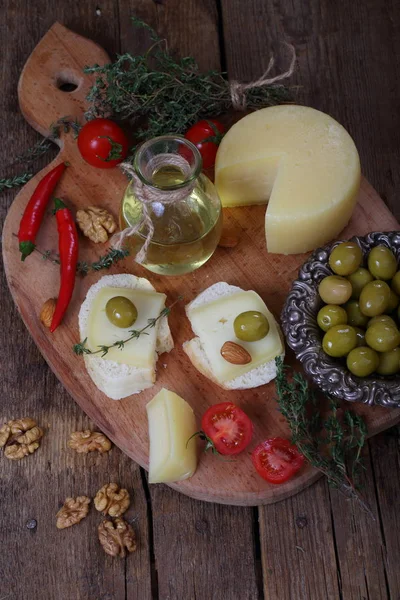 Cheese Pieces Fresh Bread Olives Nuts Tomatoes — Stock Photo, Image