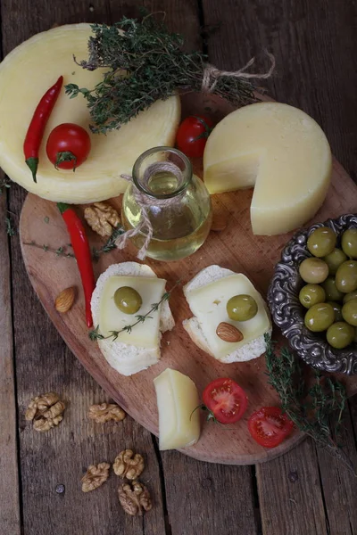 Cheese Pieces Fresh Bread Olives Nuts Tomatoes — Stock Photo, Image