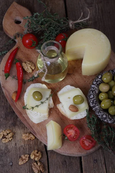 Cheese Pieces Fresh Bread Olives Nuts Tomatoes — Stock Photo, Image