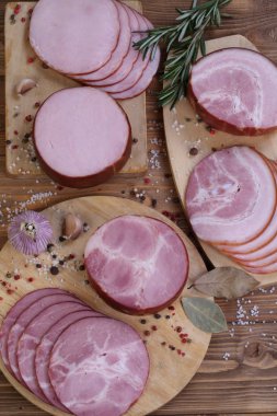 Sliced ham and bacon assorted.