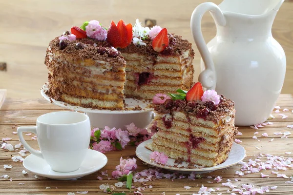 Still life with chocolate cake with strawberries