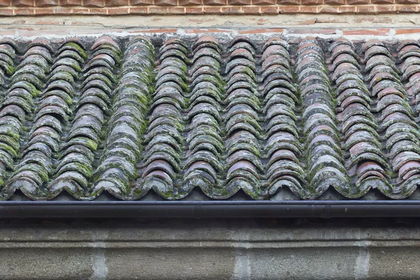 Old roof ready to get rain water.