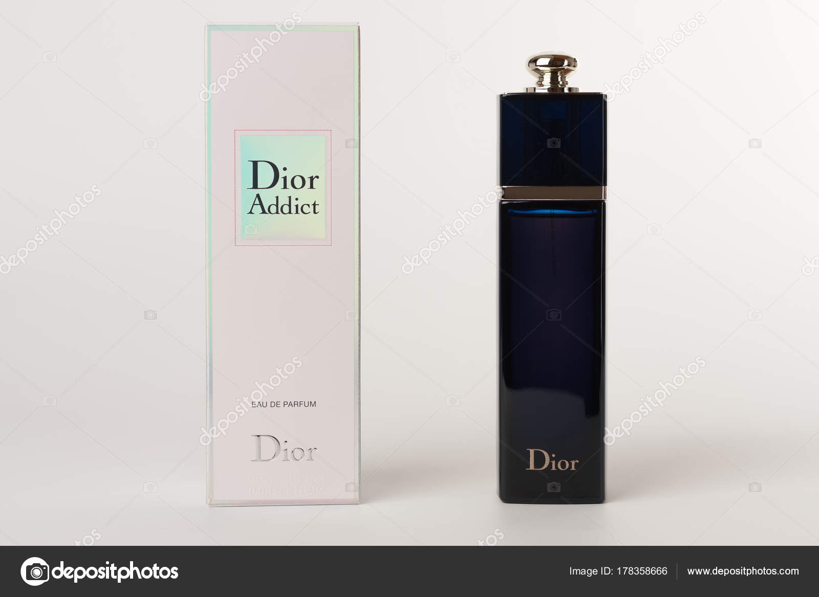 коробки и бутылка аромат для женщин Dior Addict стоковое