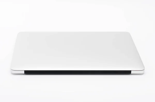 Современный закрытый ноутбук на белом фоне, вид сзади . — стоковое фото