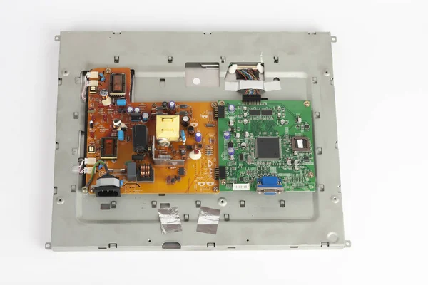 液晶モニターの2つのプリント基板,ユーロコネクタとオレンジ,チップとDサブコネクタと緑のボード. ストック写真