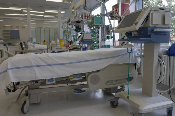 Medical ventilator and bed  in intensive care unit in hospital,  a place where can be  treated patients with pneumonia caused by coronavirus covid 19.