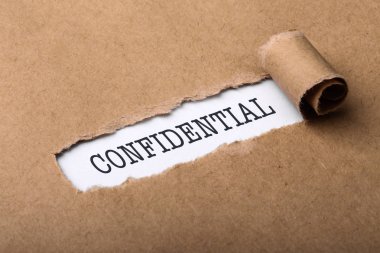Paper Tear With Word Confidential clipart