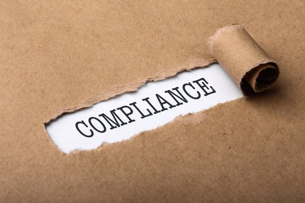 Paper Tear With Word Compliance — Stock Photo, Image
