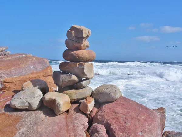 Balancing Stone Pile on the coast of the sea.