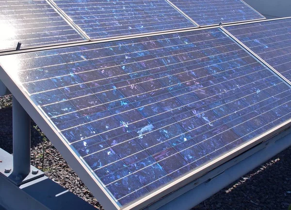 Solar panels or Polycrystalline Silicon Solar cells on rooftop of building.
