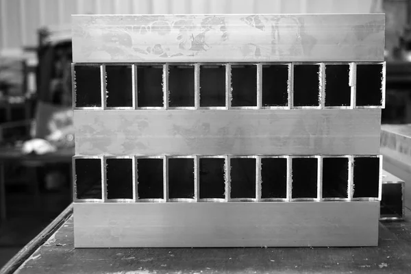 Zásobník hliníkové čtvercové trubky — Stock fotografie
