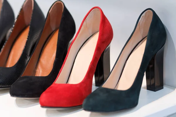 Women's high-heeled shoes on the counter closeup Stock Image