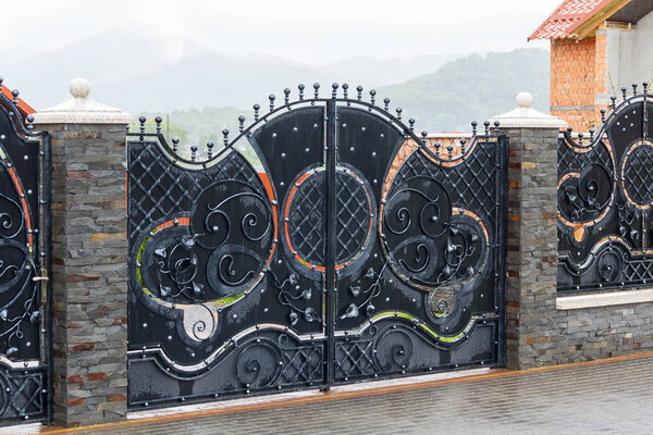 Luxury wrought iron gates in a country house
