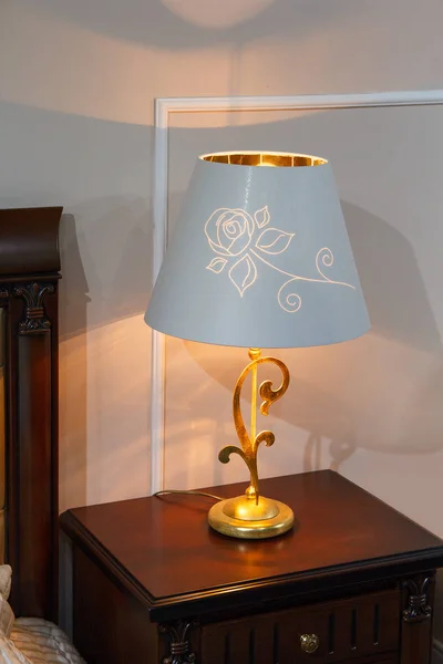 Lamp with a lampshade in the classic style in the bedroom — Stock Photo, Image