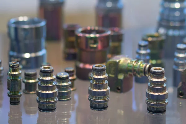 Metal fittings on the counter closeup. Industry