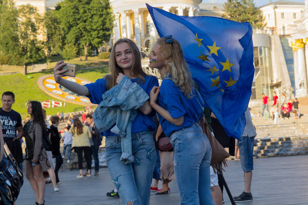 Kiev, Ukraine - June 10, 2017:  Girls with the flag of the European Union on the Independence Square