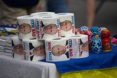 Kiev, Ukraine - July 01, 2017: Toilet paper featuring Russian President Vladimir Putin in a souvenir shop on the Independence Square clipart