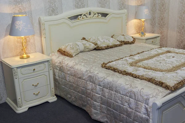 Luxury bedroom furniture in a classic style. Interier