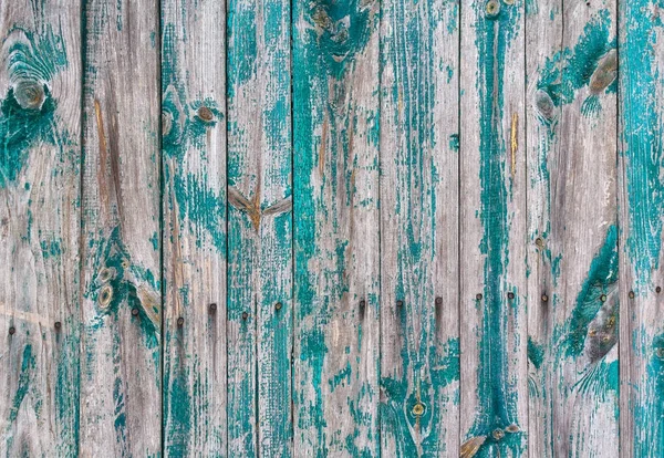 Vieja cerca con los restos de pintura verde. Fondos y texturas — Foto de Stock