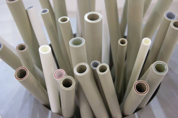 Sample of plumbing plastic pipes close-up. Industry